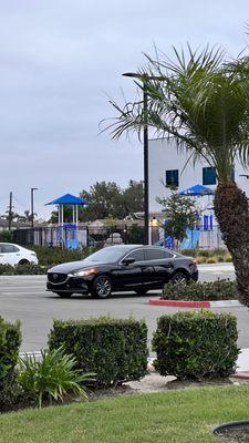 Our Mazda 6 getting picked up by our client for a rental.