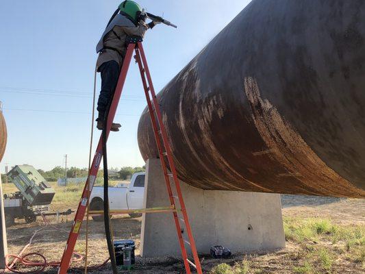 Sandblasting propane tanks