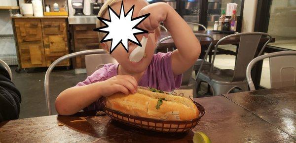 My son loved his pork meatball banh mi. His preferred method of eating it was to use a soup spoon to scoop out the insides.