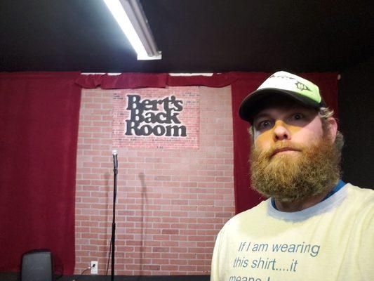 The opening of a new minor comedy club for shows and open-mics. Sorry the guy in the picture is ugly.