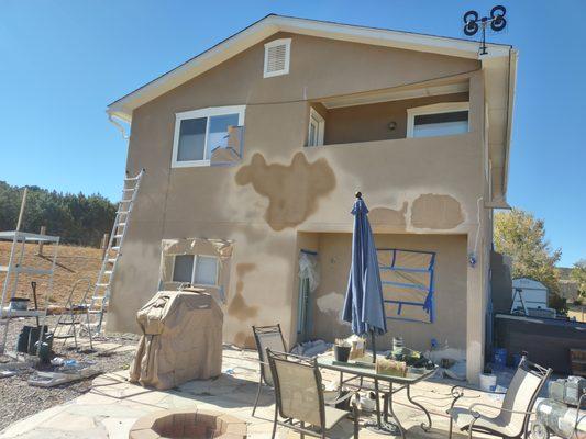 Stucco repair, color match, and full exterior.