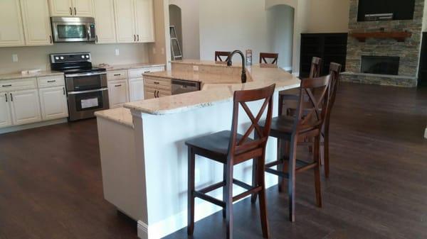 All white custom kitchen with a spacious island to seat 6 people