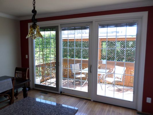 Sliding glass door, white vinyl, installed in a 
residence in Alexandria, VA