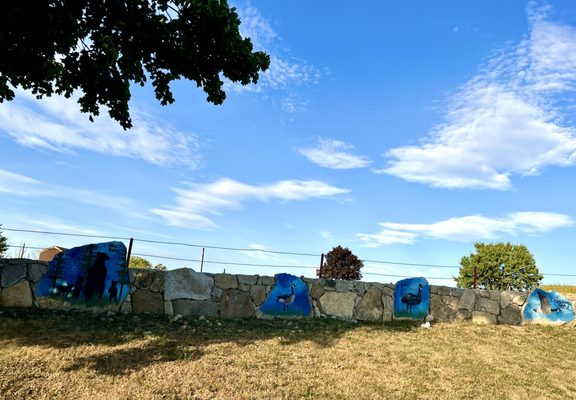 Animal artwork on outside wall