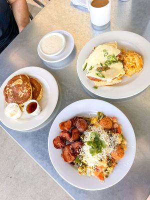 Buttermilk flapjack short stack, goat cheese grits (a la carte), migas with chorizo, Phoebe's benedict