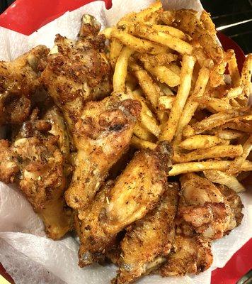 Garlic and Herb Wings served with thin homemade fries