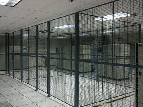 partial shot of data center floor - dedicated cages for colocation customers.