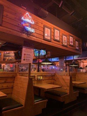 Dining area with bar area in background