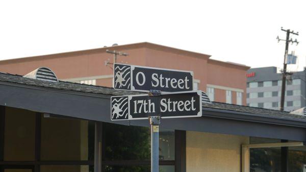 Street sign showing 17th & O right outside our building