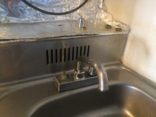 Kitchen faucet missing hot side handle. Wow this is a well managed property.