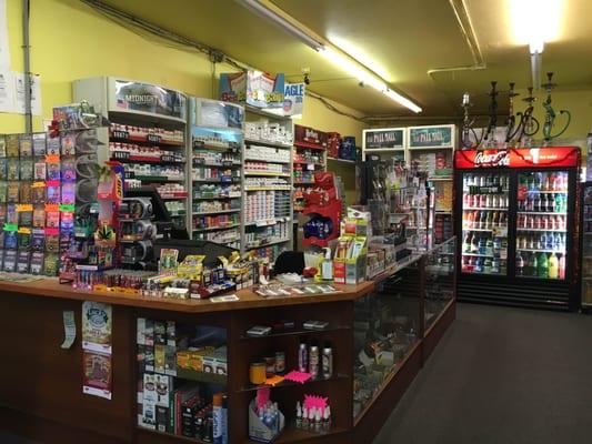 Store Interiors. Wide selection of: Cigars, Hookahs, Cigarettes, Tobacco etc.
 Play Lottery and Keno