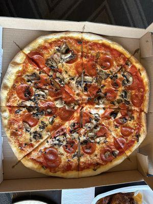 Pepperoni and mushroom pizza