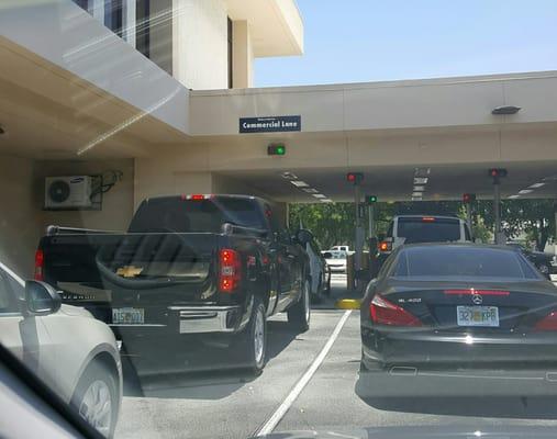 Seven cars in two lanes, tellers needed  at the drive thru!!