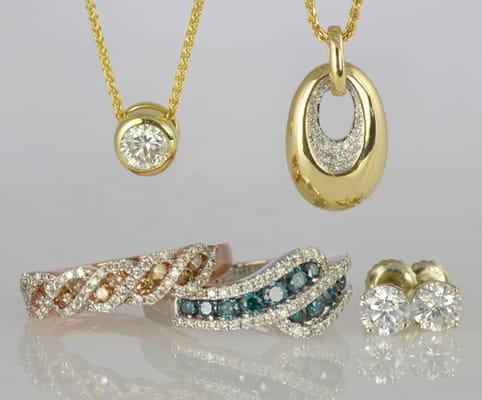 Genuine diamonds, white, champagne, and blue, all stunning and set in 14 karat gold!