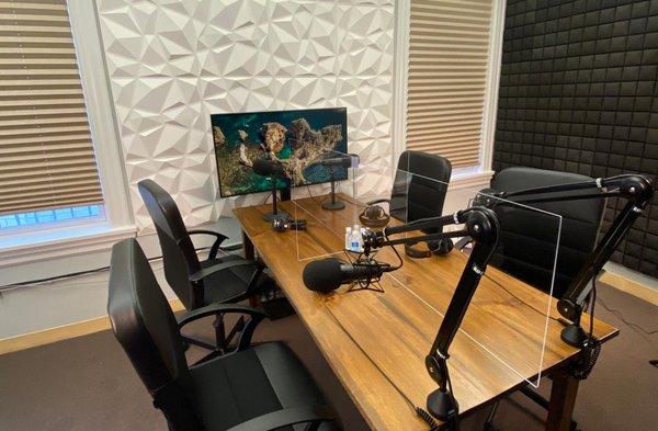 Our studio is fully sound-proofed with plexiglass dividers between podcasters and hand sanitizer at each podcasting station.