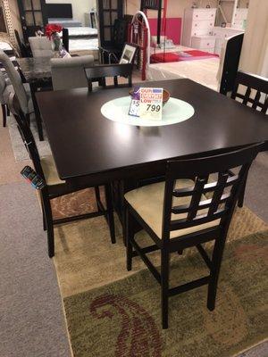 On sale for $749 lazy Susan and storage dining table!