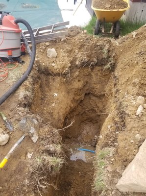 Line ruptured 8 feet underground.  I dug the hole with my backhoe with ramp access and they came to repair the line.