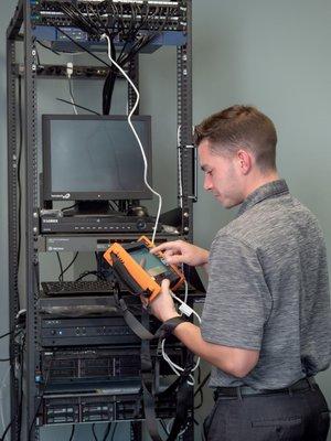 Mikey testing out network wiring and security camera wiring.