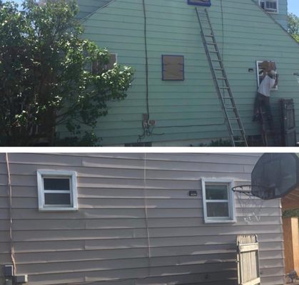 Painting Siding.