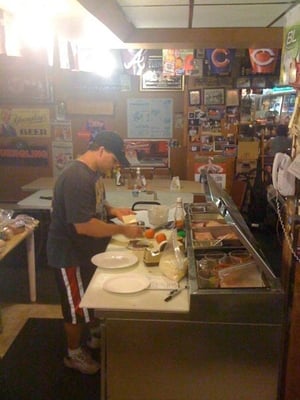 Ed fixes a loaded cheesesteak, August 2009