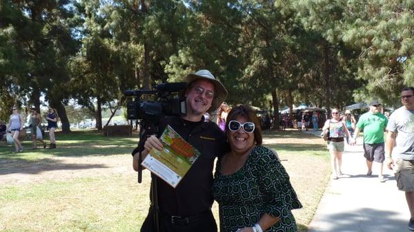 Robert helping a lady find her way while filming at the Big Irish Fair and Music Festival 2014