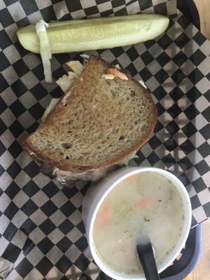 Half sandwich (roast beef Rachel) and soup (chicken and rice)