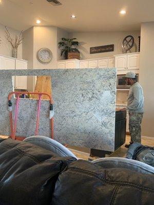 White ice granite- installing full slab for island