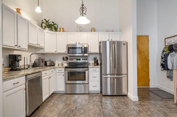 Sample Kitchen with stainless steel appliances and updated cabinets