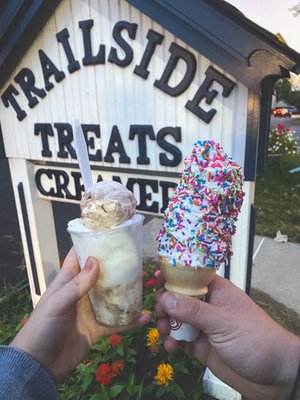 Large vanilla soft serve on a cone, light sprinkles & samoa ice cream with coconut Italian ice gelati!