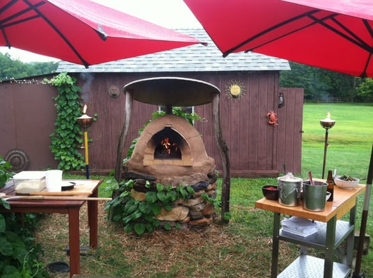 Hand-made earthen oven and oven shelter at a client's home - great for pizza parties!