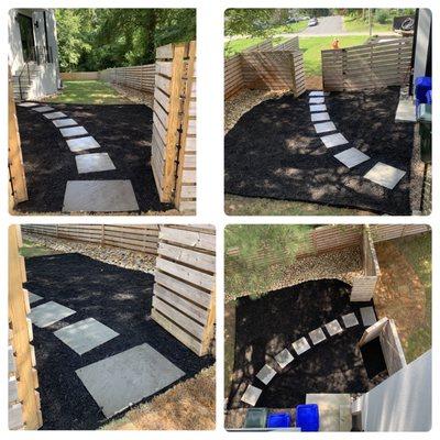 Stepping stone walkway in a mulch bed.