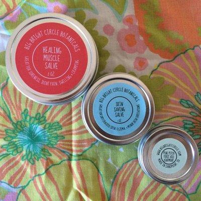 Salves featuring oils solar infused with healing herbs. Healing Muscle Salve, Skin Saving Salve, Pine Pitch First Aid Ointment 3