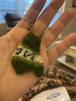 The cutest alpaca yarn tiny glove keychain