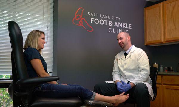 Dr. Christiaan Goebel, DPM, podiatrist, with patient.