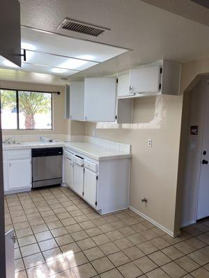 Other side of kitchen, Begay Painting installed new hardware, too.