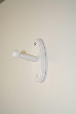 Coat hooks included (screws are not).