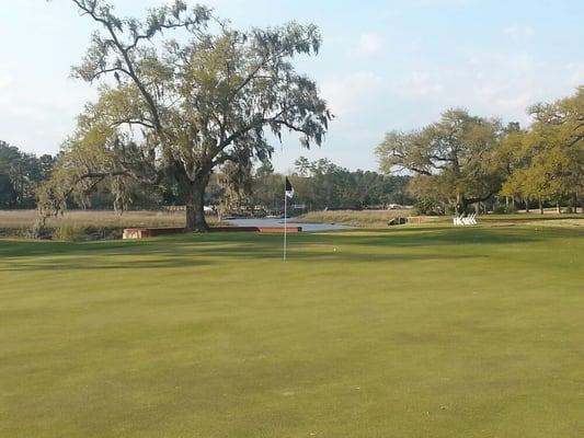 Picturesque 18th hole green at Dunes West Golf Club