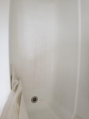 Tub is disgusting, the shower curtain is just a curtain not a liner so water leaks through it.