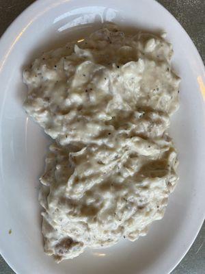 Biscuit (you only get ONE) with sausage gravy.