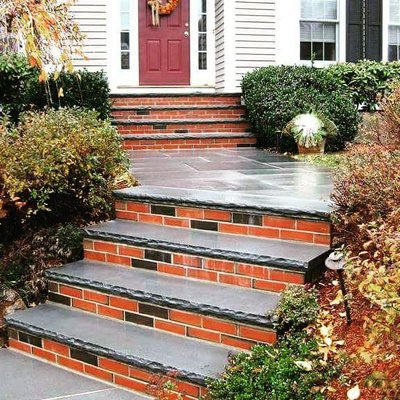 Brick steps with rockfaced bluestone treads