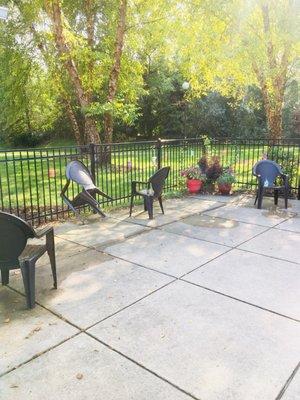 Nice patio area with bird feeders, nice views here