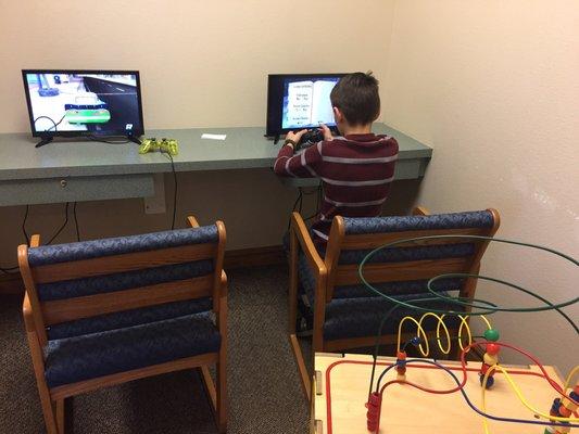 Waiting area has video games, toys & books