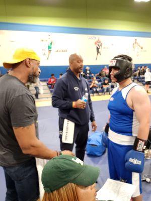 Coach Anthony, Coach Kevin and youth boxer Ali