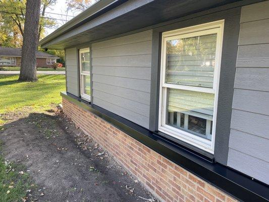 Black Anodized Siding to brick drip edge flashing