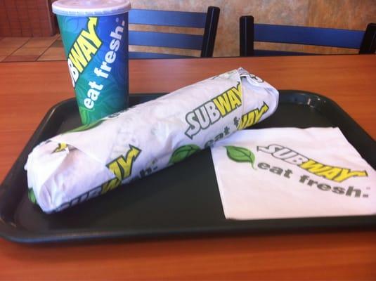 Black forest ham foot long with iced tea By: LEO