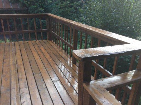 Construction of exterior patio deck application of stain and water seal