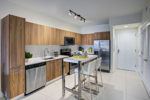 Kitchen with Stainless Steel Appliances and Tile Flooring