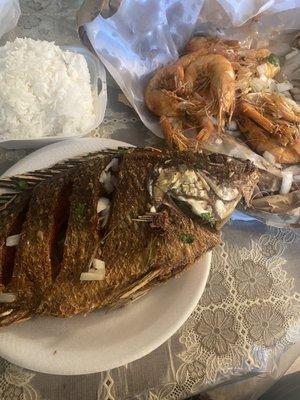 Fry Tilapia and one pound of fry shrimp  and a side of steam rice all this for $20