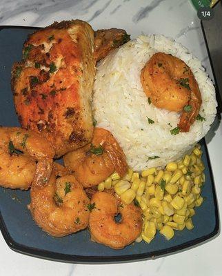 Baked Salmon served with jasmine white rice with sweet corn & buttered shrimp