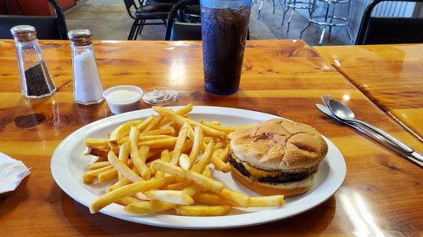 I love a plain cheeseburger but burgers come with all the fixins'  Fries were yummy too!